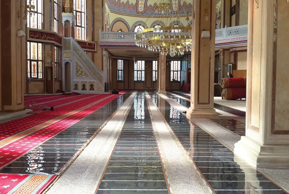 Cami halısı altına uygulanan ısıtma sistemi